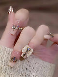 24PCS Nude 3D Bow Crystal Press On Nails â€“ Luxury Rhinestone Design