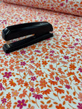 Orange Flowers Jersey - Per 50cm - Family Fabrics B.V.