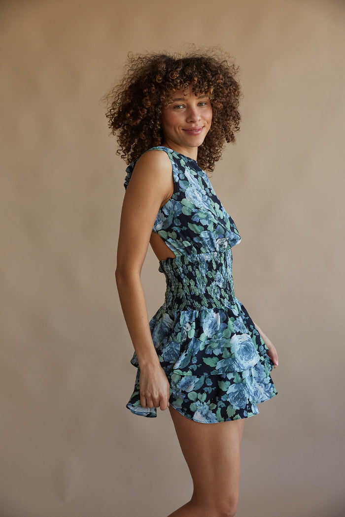 blue floral high neck smocked waist open back tiered ruffle romper | unique sorority rush outfits 2024