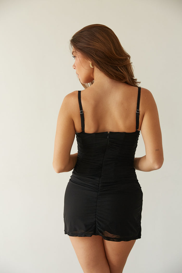 back view | black lace trim mesh ruched bodycon mini dress
