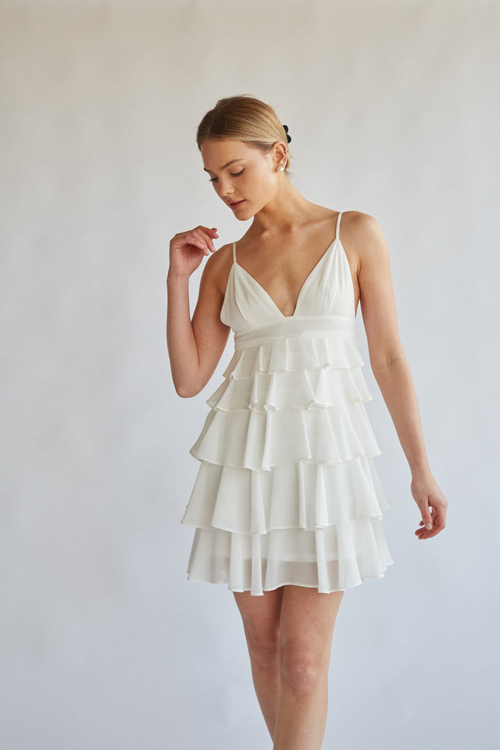 front view white v neck tiered ruffle mini dress with spaghetti straps - white-image | graduation mini dress | sorority rush dress | bride to be white mini dress for bridal shower
