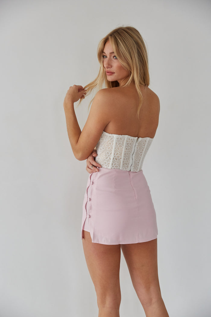 pink button mini skort