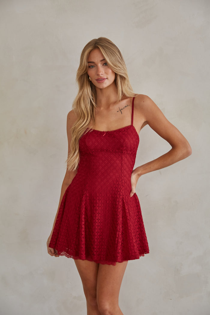 front-image | delicate bow mini dress | lace detailing mini dress | vibrant red mini dress | feminine lace mini dress | flared skirt mini dress