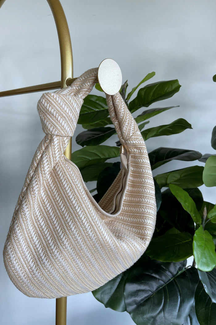 tan woven shoulder bag with knot detail