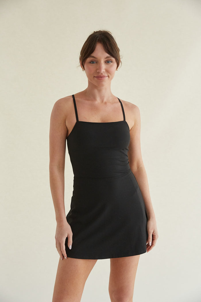 butter-soft black mini tennis dress with shorts