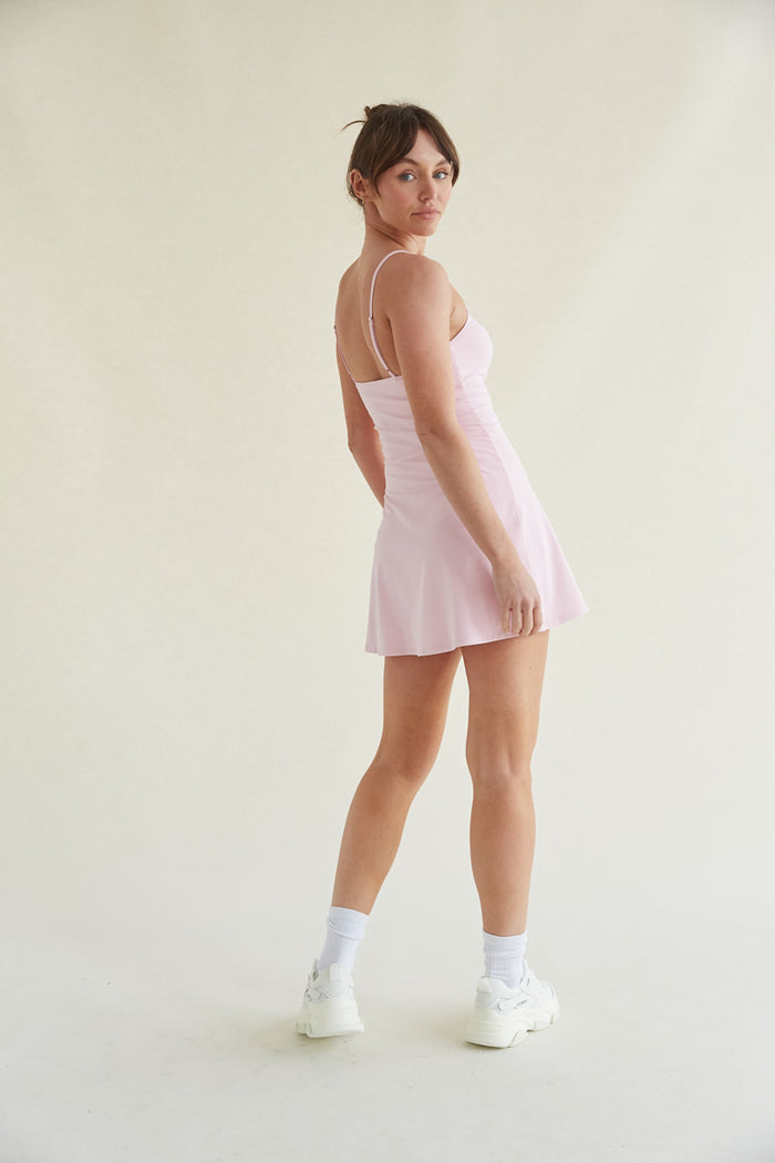 baby pink tennis skort dress with adjustable straps and buttersoft fabric
