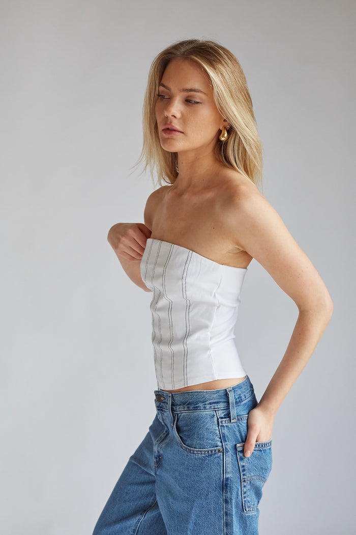 white corset top with black double stitched vertical lines | cool girl aesthetic outfit boutique