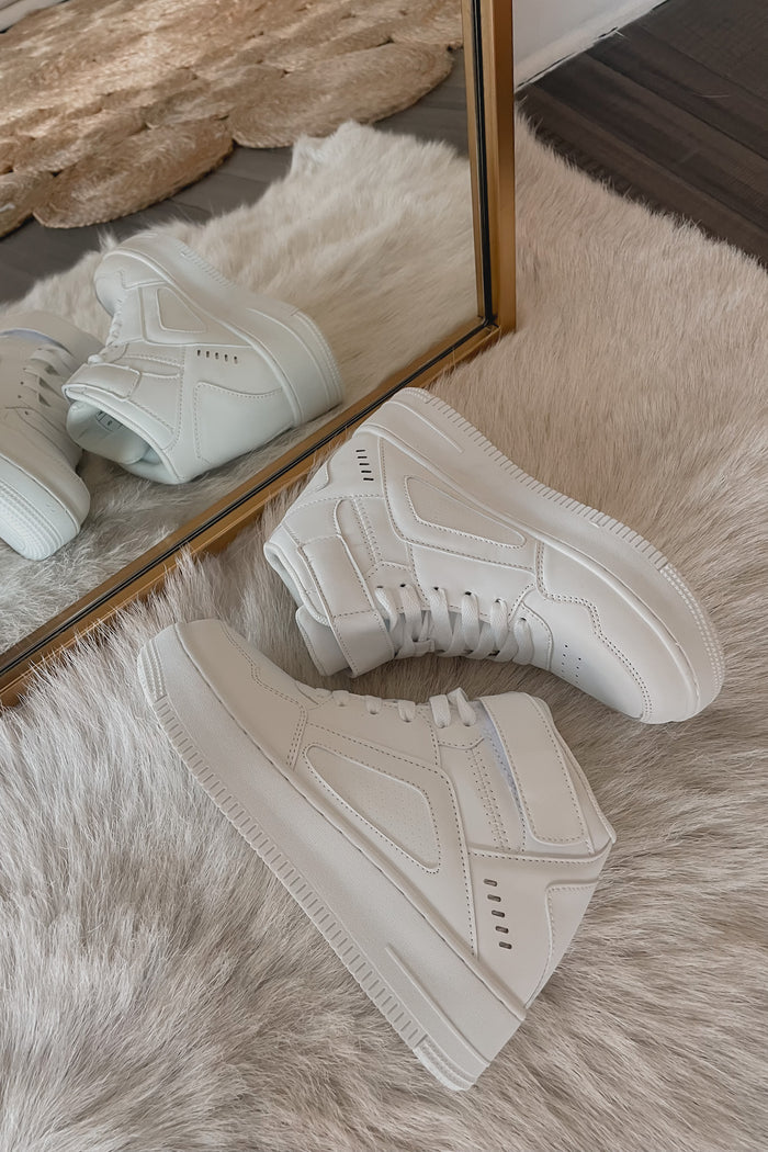 plain white sneakers