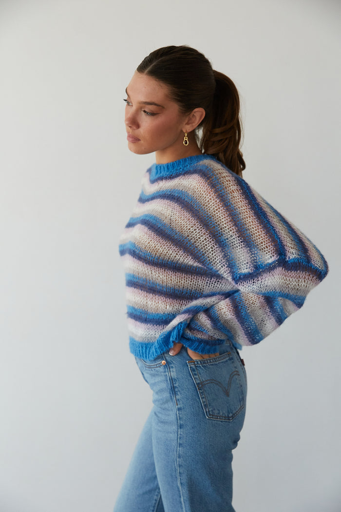 side view | blue and purple striped light weight knit cropped sweater