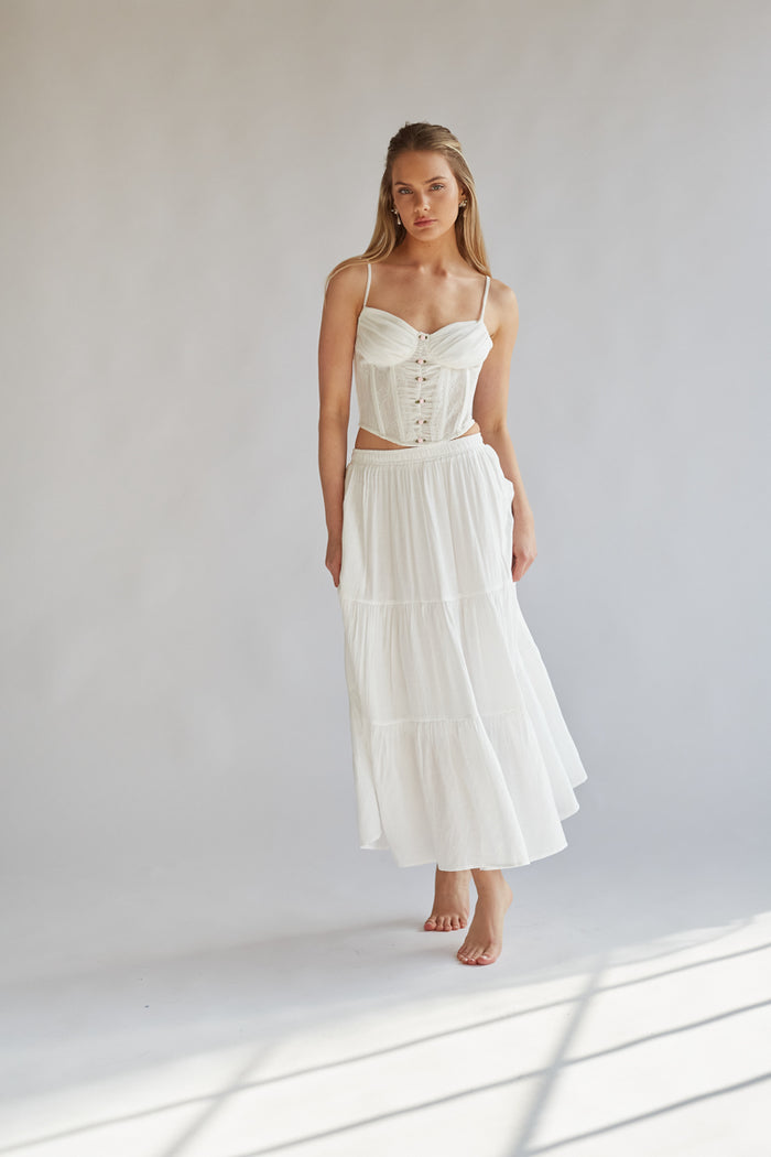 white corset top with lace paneling and rosette detailing | soft girl aesthetic corset top