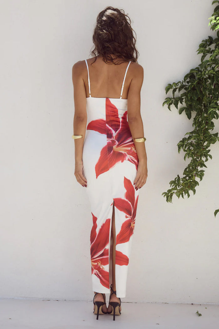 back-image | floral print dress | back view revealing the simple yet stylish design with delicate straps and a clean silhouette.