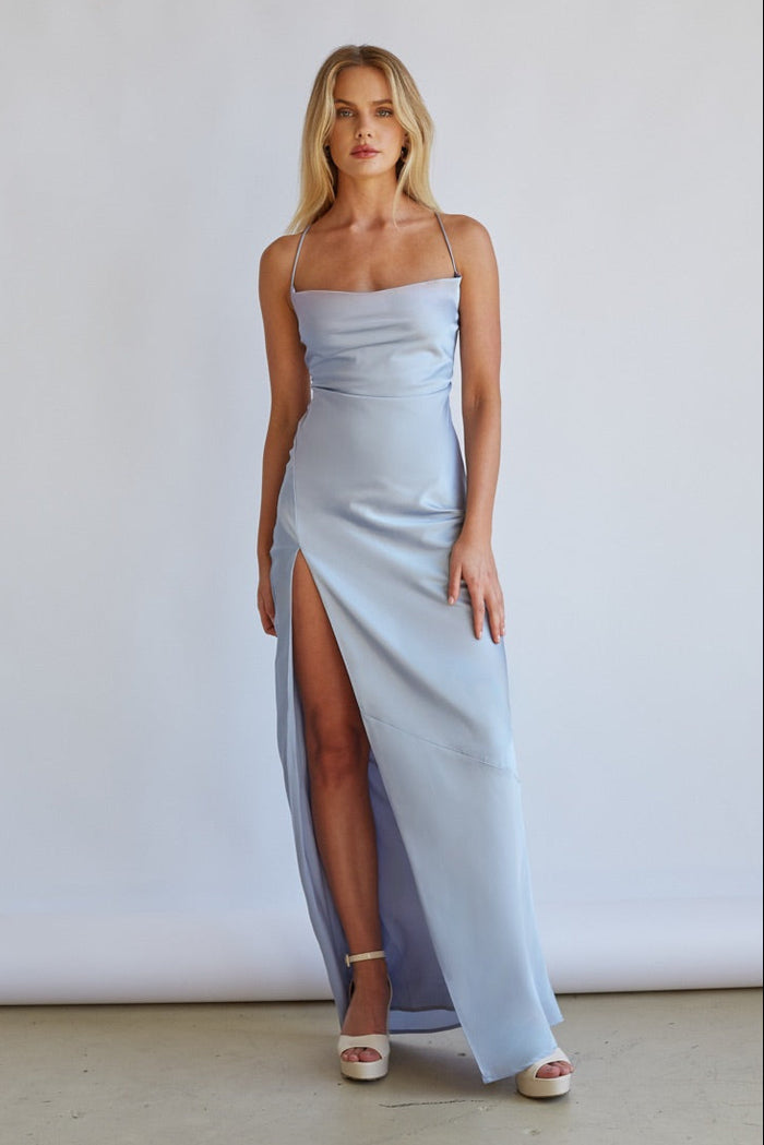 Detail-image | Satin Slip Maxi Dress | close-up showing the luxurious sheen of the light blue satin fabric and the elegant cut of the dress.