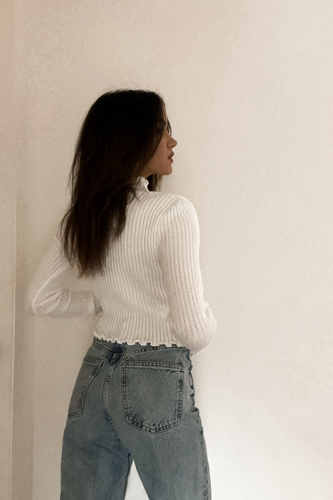 white mock neck top