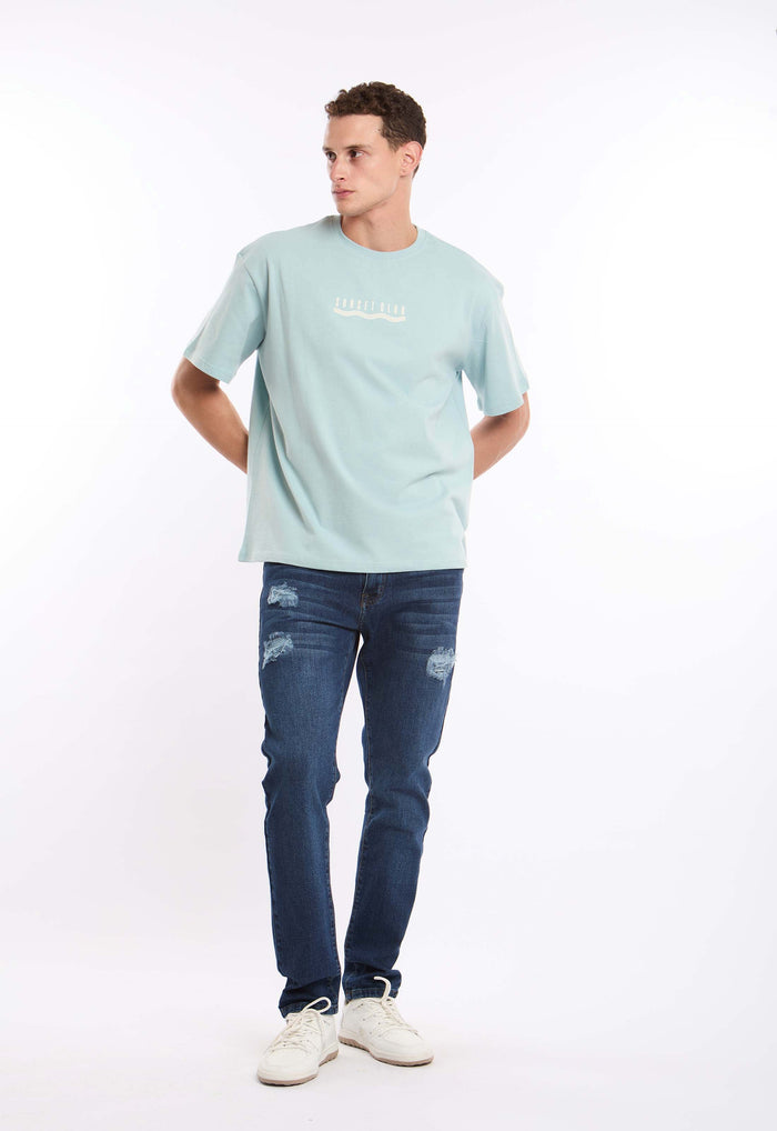 Distressed Slim Denim Jeans