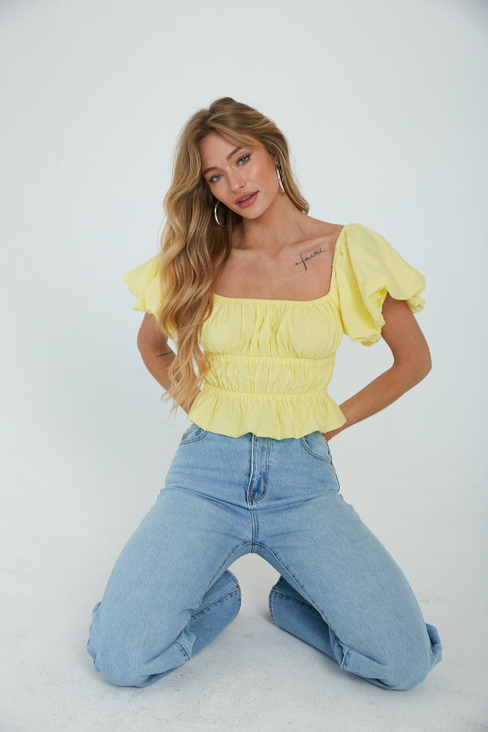 yellow tiered ruffle crop top