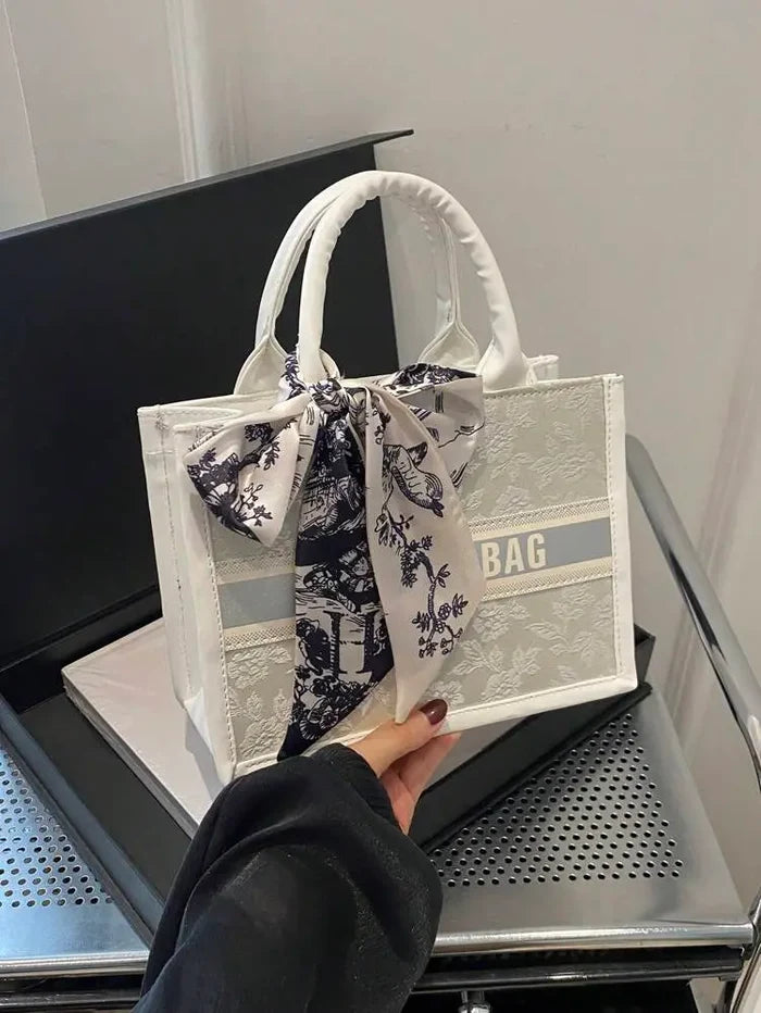 Elegant Structured Handbag with Printed Scarf Bow â€“ Classic Chic Style | Delicado
