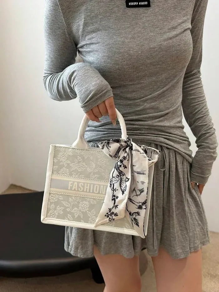 Elegant Structured Handbag with Printed Scarf Bow â€“ Classic Chic Style | Delicado