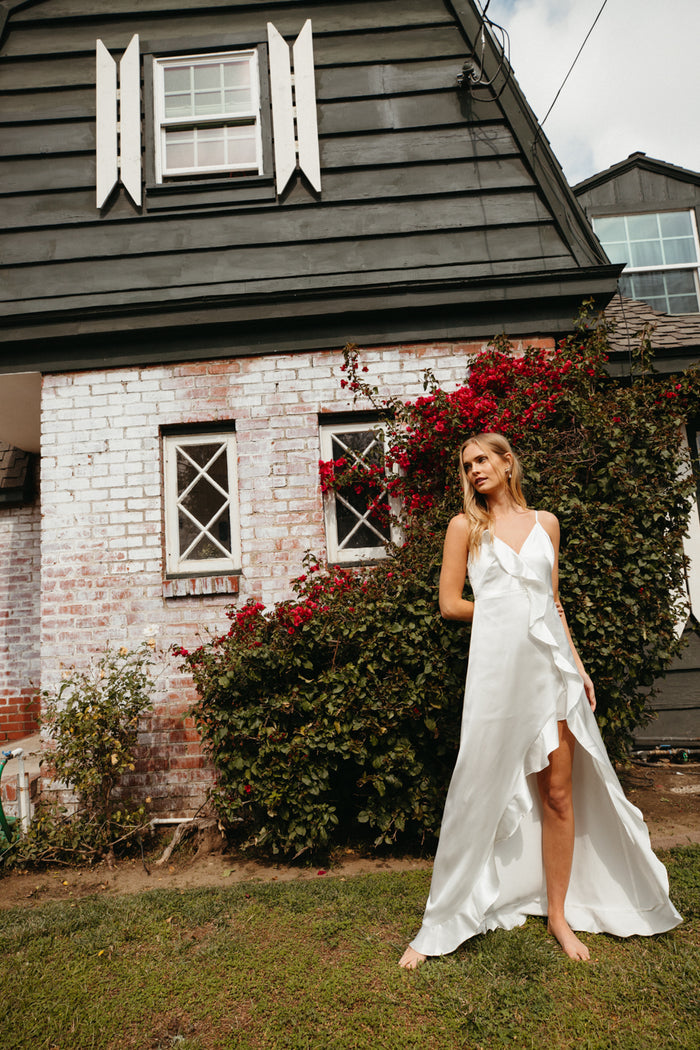 white cascading ruffle satin maxi dress