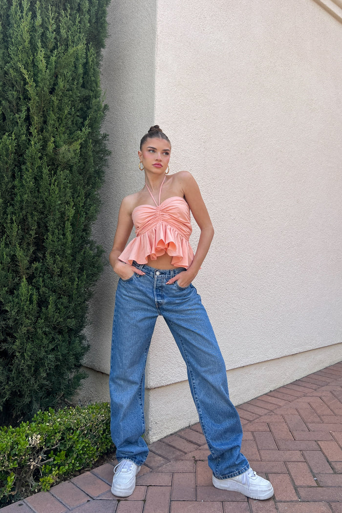 smocked peplum halter top in coral