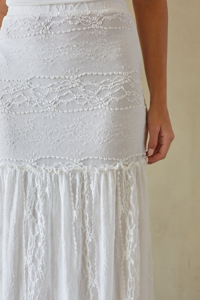 Detail-image | Tiered Maxi Skirt | close-up view of the lace details and the skirt’s pleated texture.