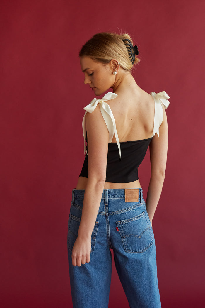 white satin bow ribbon strapped black corset crop top | high contrast going out tops