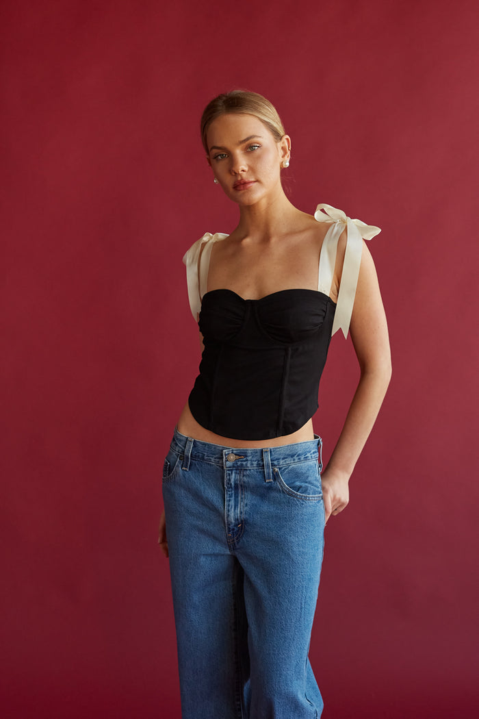 b+w corset top with bow straps | chic going out tops for spring 2024