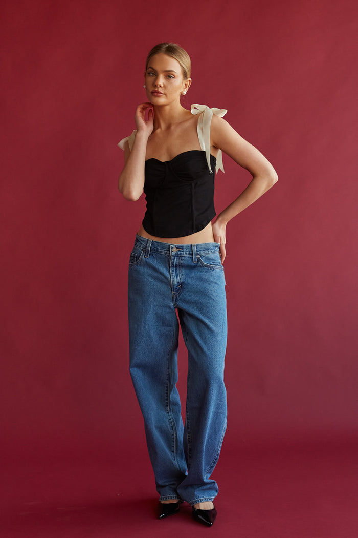 black bustier corset crop top with contrast white satin ribbon tie straps | timeless old money top