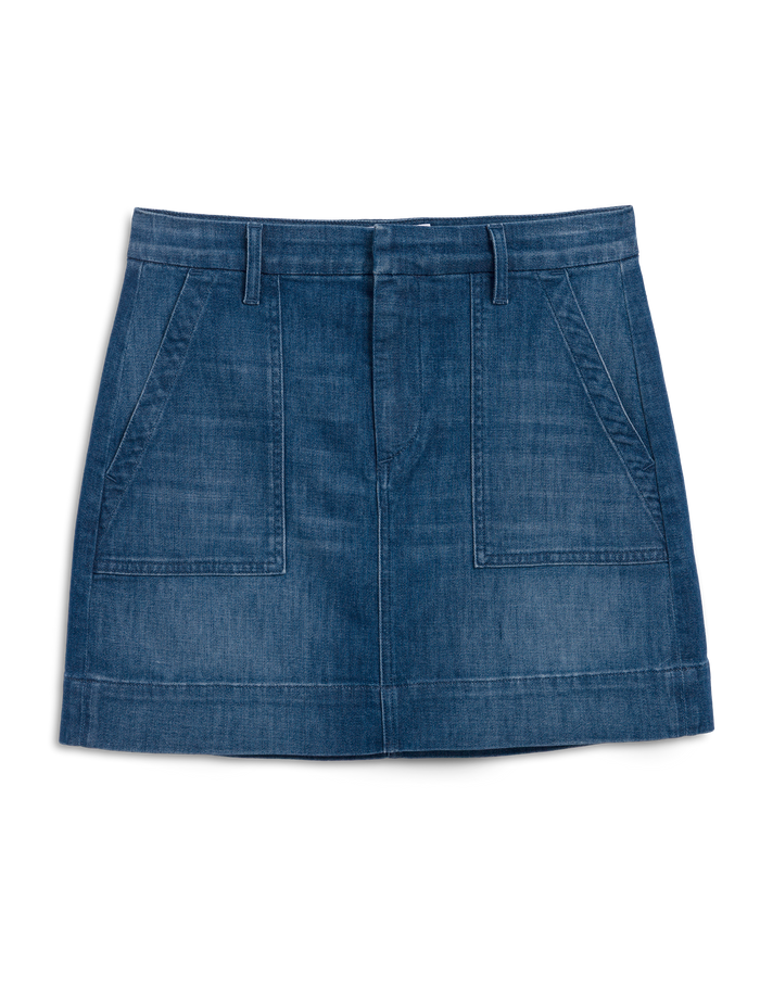 Blue denim skirt on a white background
