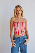 red-image | Front-image | Gingham Front Tie Corset | front view showcasing a red and white gingham corset top with a front tie and structured design.