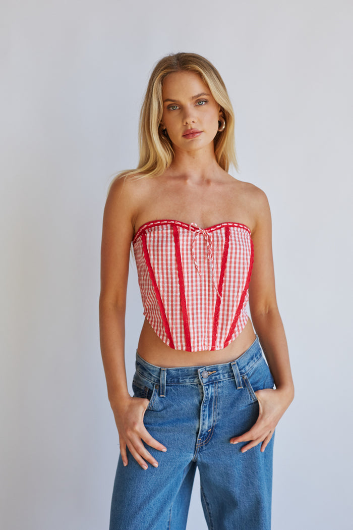 red-image | Front-image | Gingham Front Tie Corset | front view showcasing a red and white gingham corset top with a front tie and structured design.