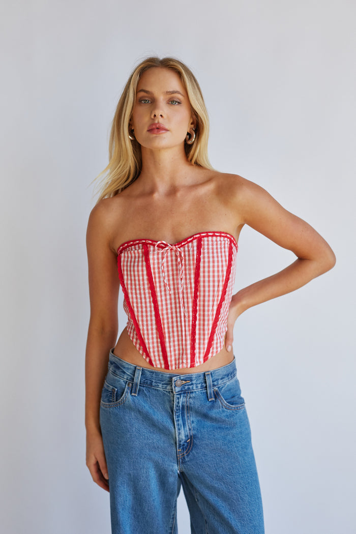 Front-image | Gingham Front Tie Corset | front view emphasizing the V-neckline, front tie, and gingham checkered pattern.