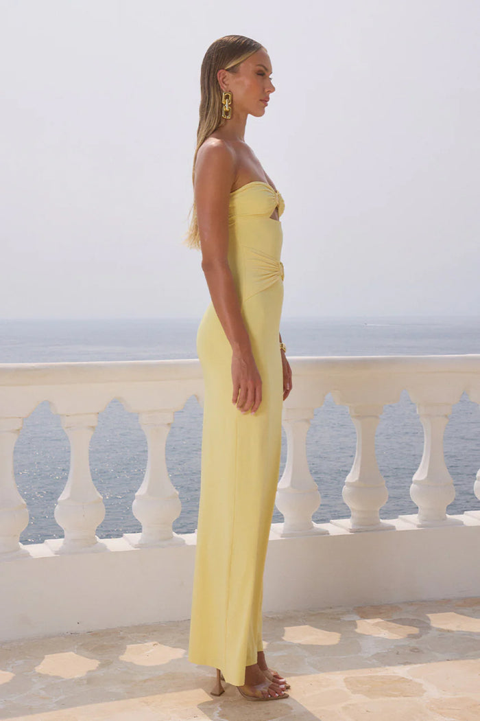 side image | Kleo Maxi Dress | modern and flattering | side angle emphasizing the shape-enhancing silhouette and slit.