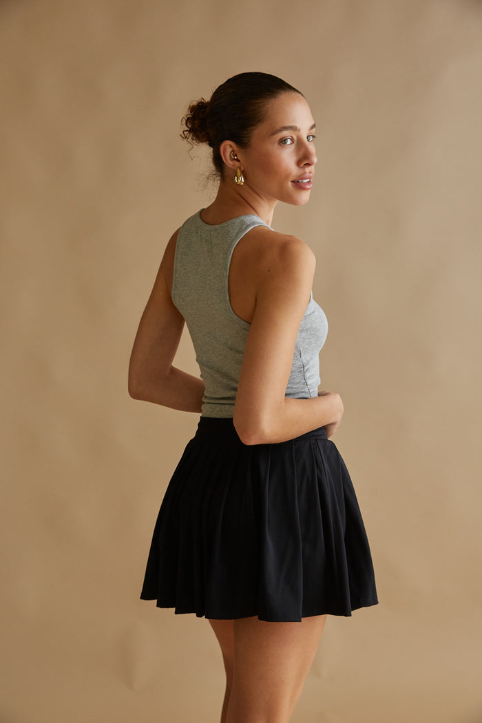 black pleated circle skirt