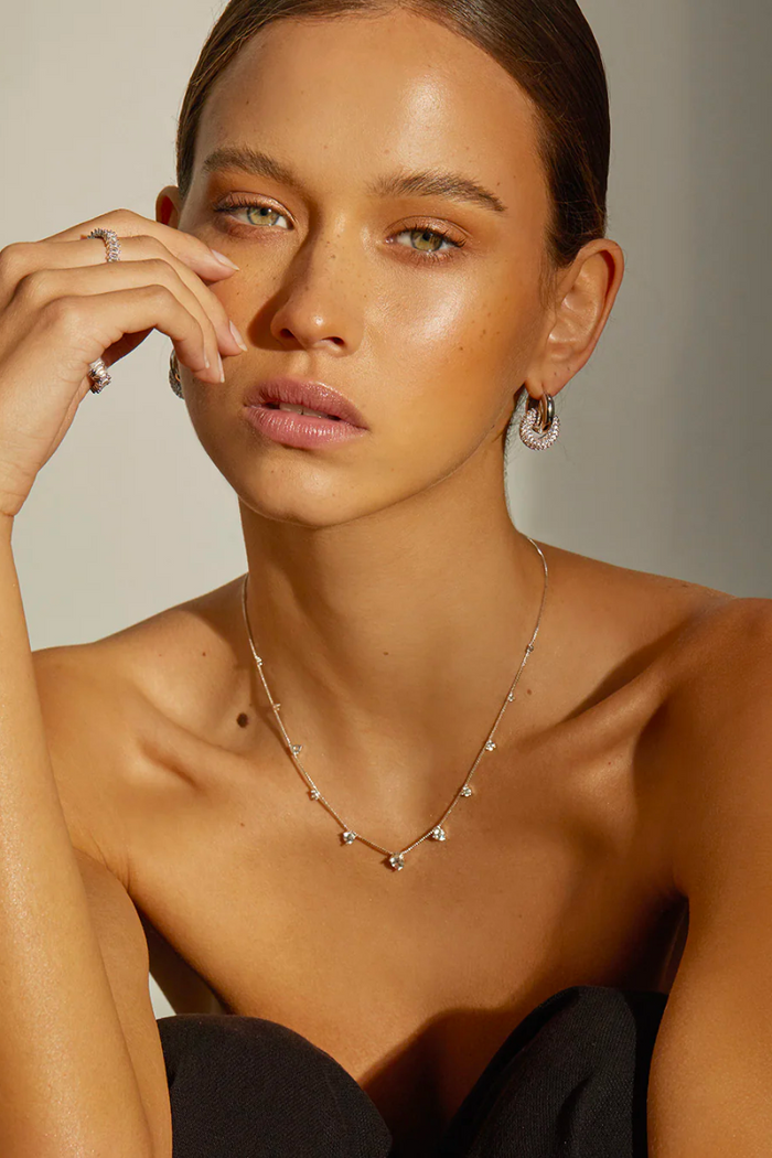 luv aj interlock hoops in silver
