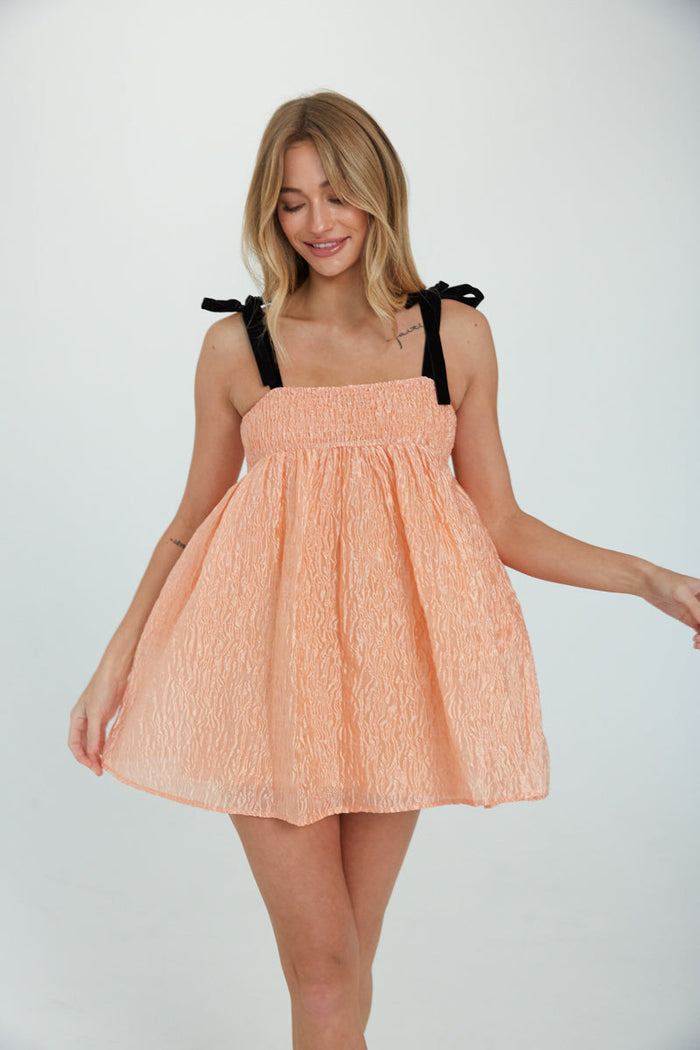 peach crinkle babydoll dress - black velvet bow tie babydoll dress - spring dress inspo