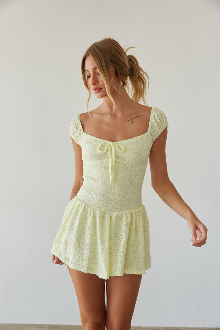 front view | bright pastel yellow lace puff sleeve mini dress | summer dress outfits | yellow image