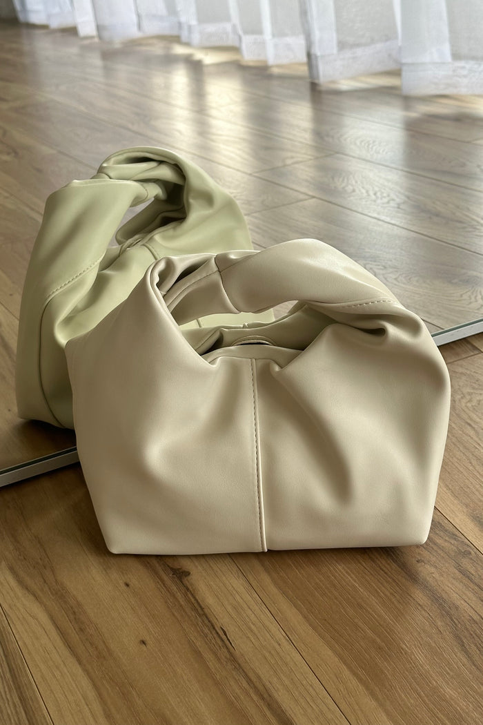 standing view | ivory knotted handbag | small white purse for fall