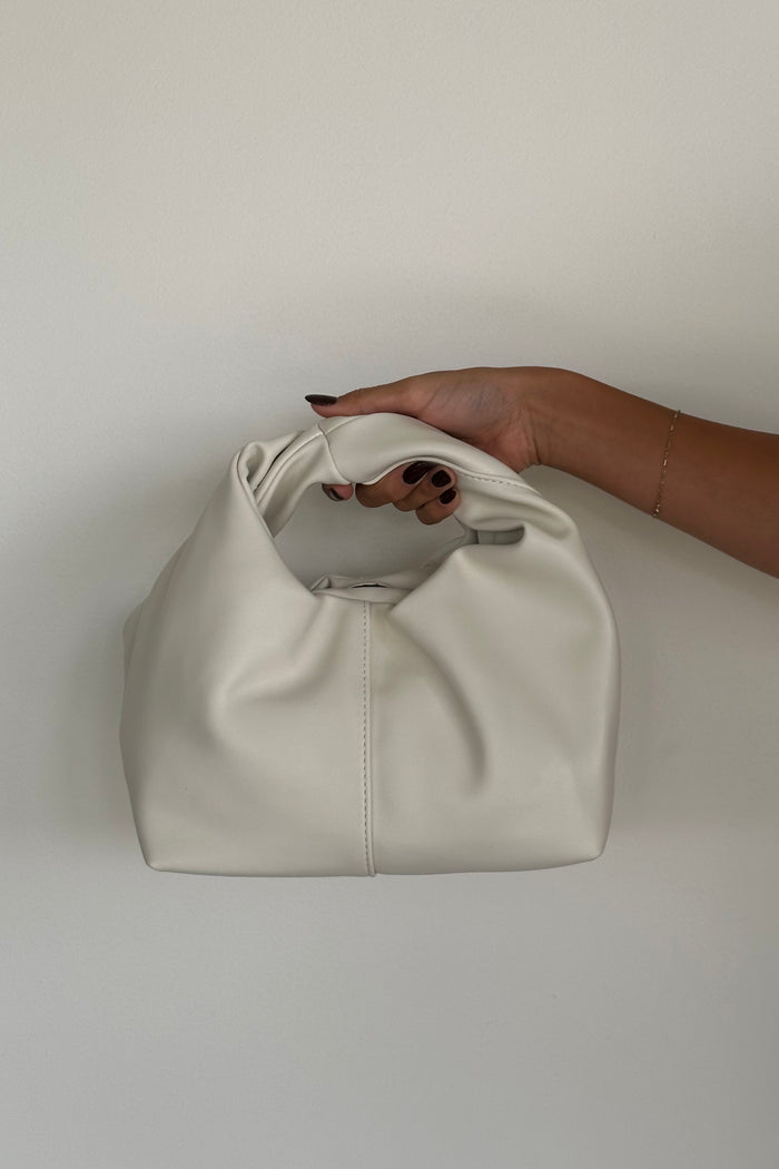 hand held view | ivory knotted handbag | small white purse for fall