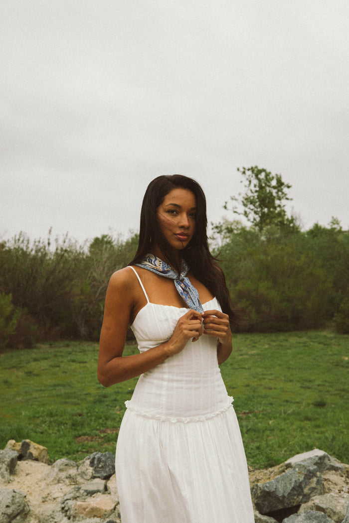 front-image | white maxi dress | another front view, captured in a natural setting with the model confidently wearing the dress