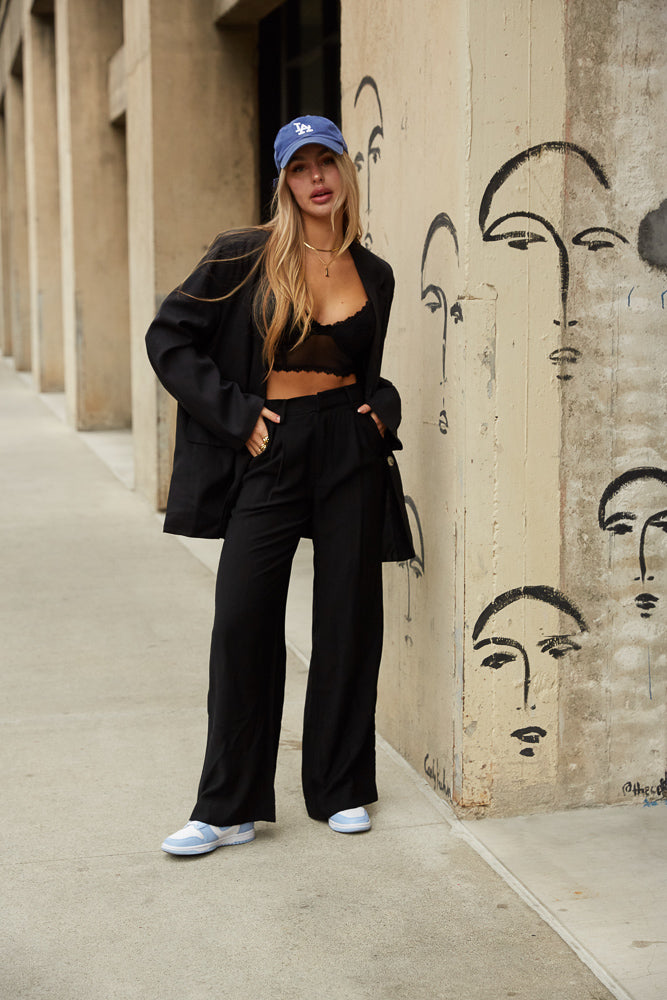 black blazer and black trouser pants