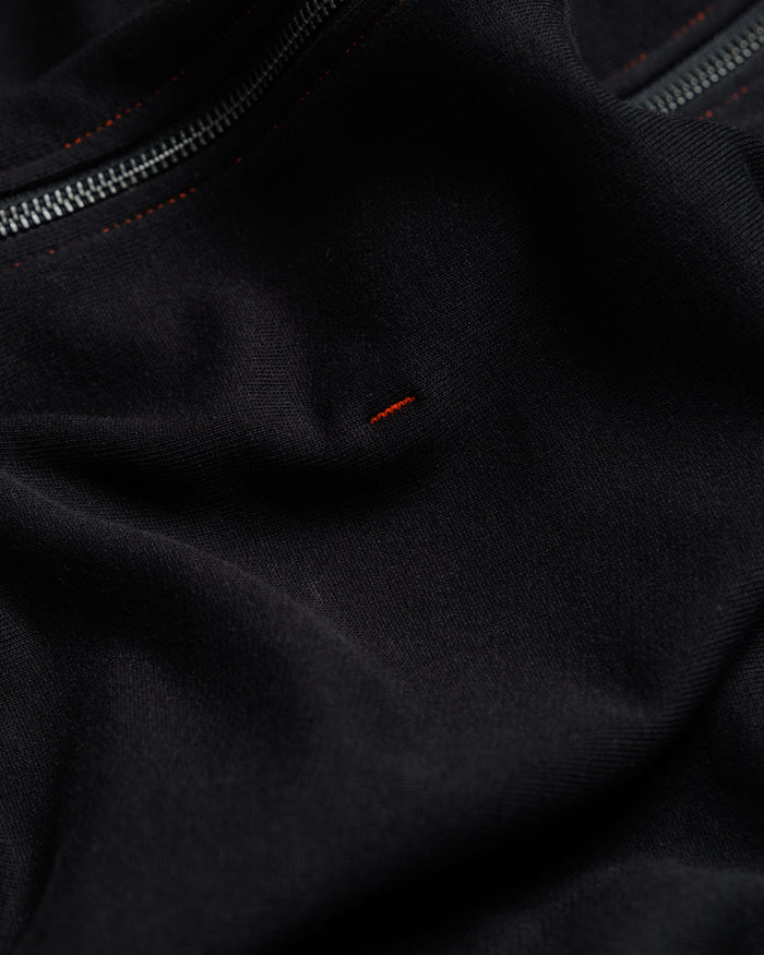 Outnback Recovery Cape in black, embroidered WAWWA logo detail