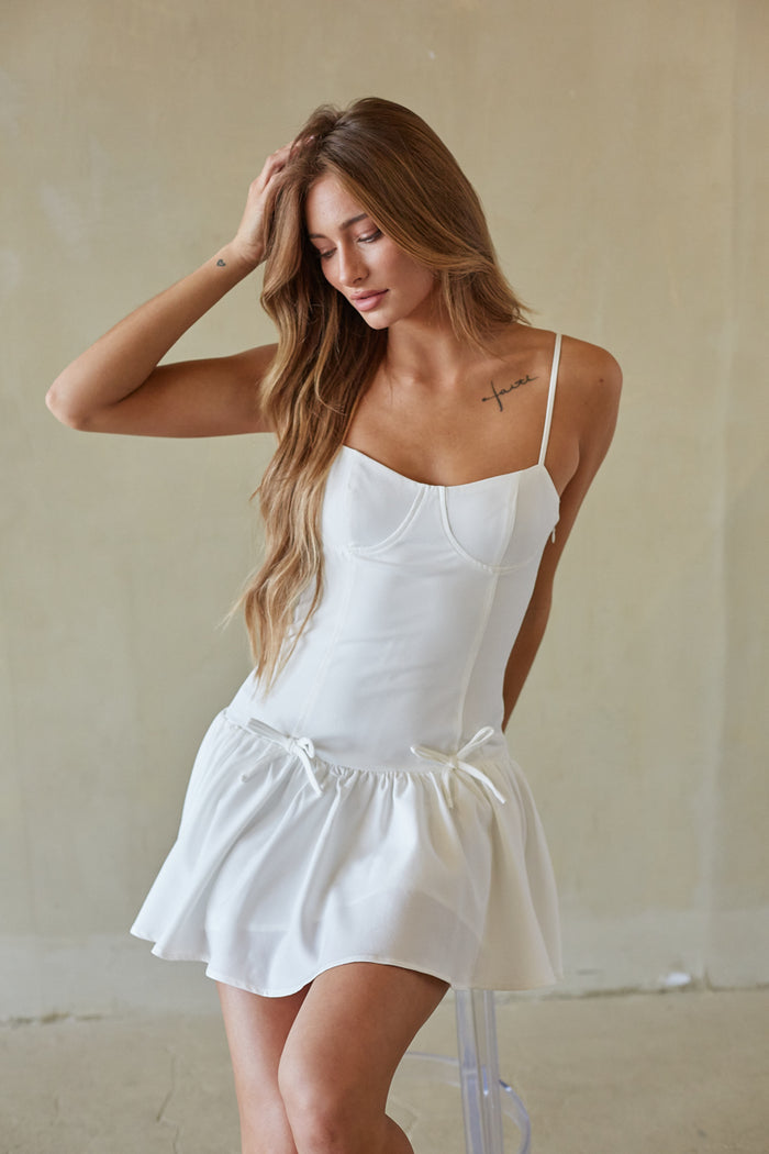 white-image | front-image | white flared dress | front view highlighting the white dress with gathered waist and delicate ties, perfect for casual days.