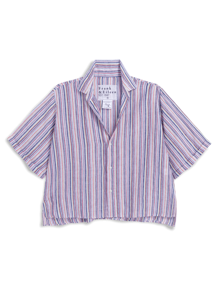 Striped shirt with brand label on a black background