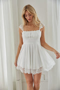 white lace hem babydoll dress - bridal shower outfit - graduation look - white image