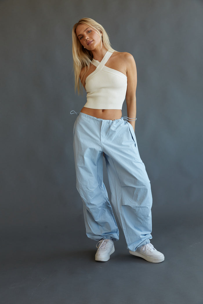 light blue parachute pants - trendy street-style pants