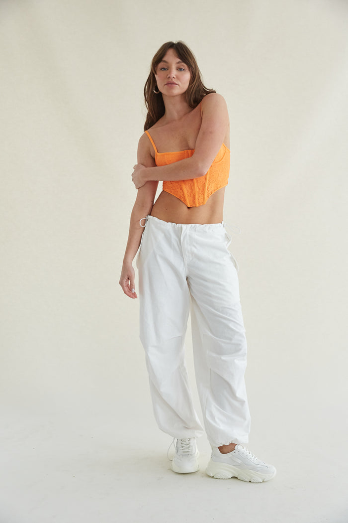 white parachute pants - styling an orange corset