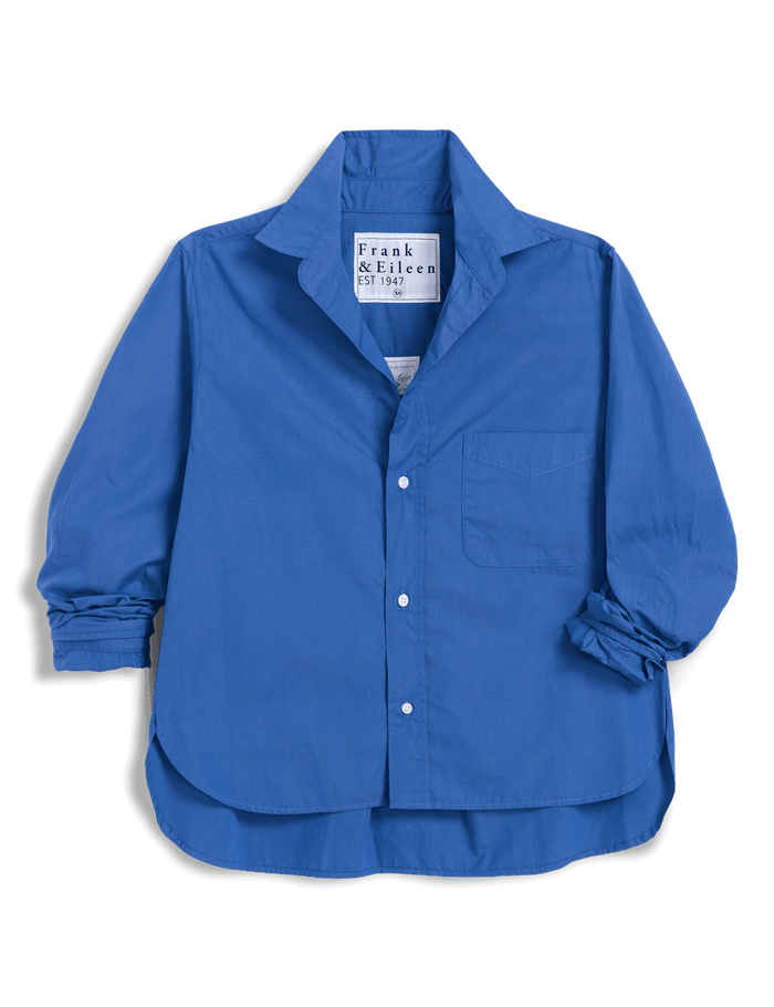 Blue shirt with rolled-up sleeves on a transparent background
