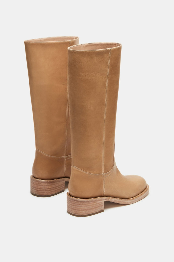 back-image | tan leather boots | back view emphasizing the simple yet chic design, highlighting the clean lines of the boots with no unnecessary embellishments.