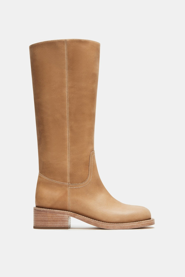 side-image | tan leather boots | classic and durable | side view focusing on the sturdy wooden heel and the smooth leather texture, perfect for everyday wear.