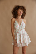 spaghetti strap pink floral fit and lfare romper | sorority rush outfit 2024